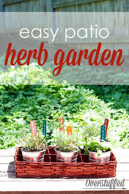 An easy patio herb garden using cheap IKEA buckets, a thrifted basket, and a little bit of spray paint