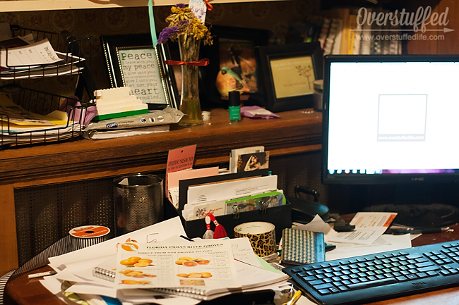 You have to ask some important questions in order to start tackling clutter problems like this messy desk.