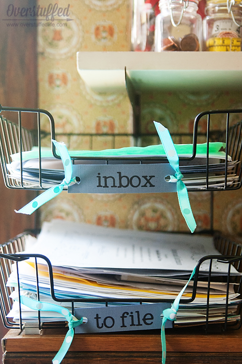 Keep designated "inbox" and "to file" baskets, and sort through them often.