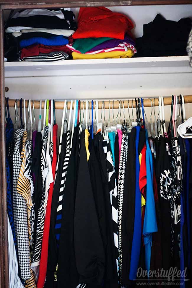 Hang your clothes in an organized manner, by color and/or type.