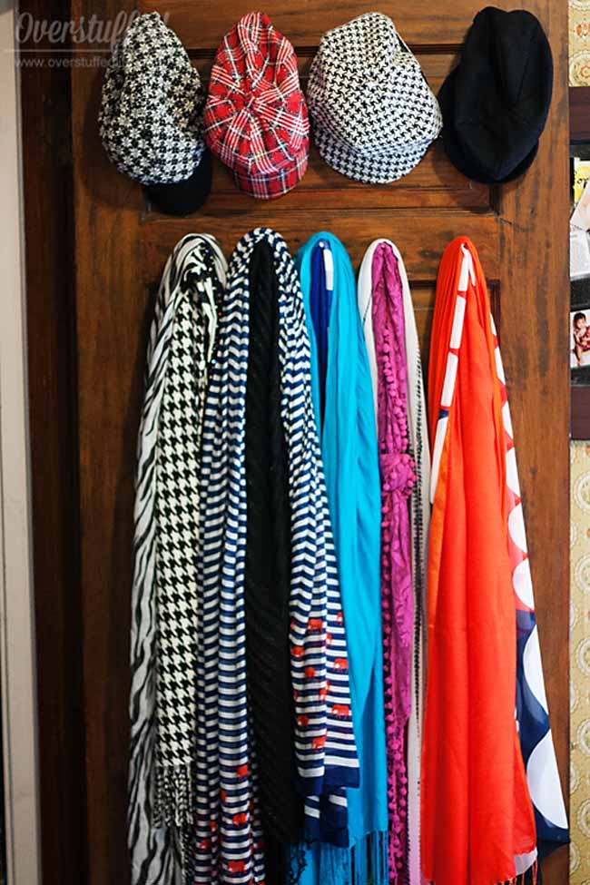 Use the closet door to keep things like scarves and hats organized.