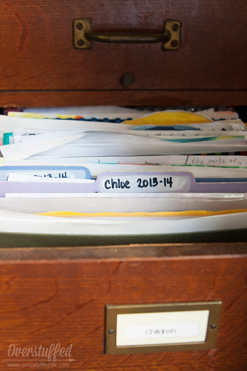 File the papers your child wants to keep by school year.