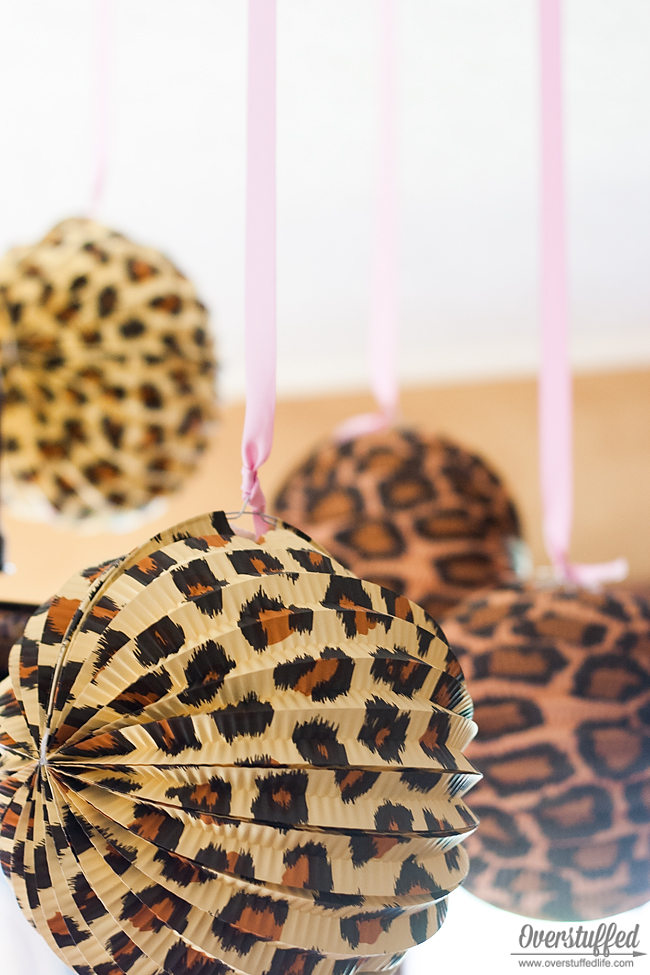 Cheetah and leopard printed paper lanterns are an easy party decoration for your cheetah themed birthday party. #overstuffedlife