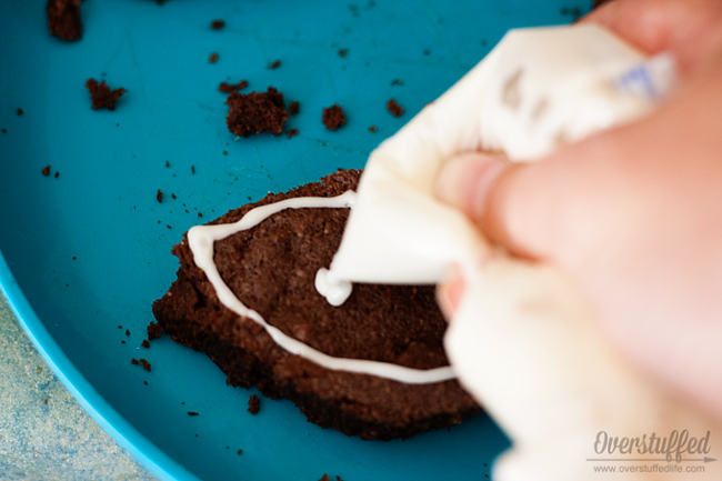 Icing football brownies