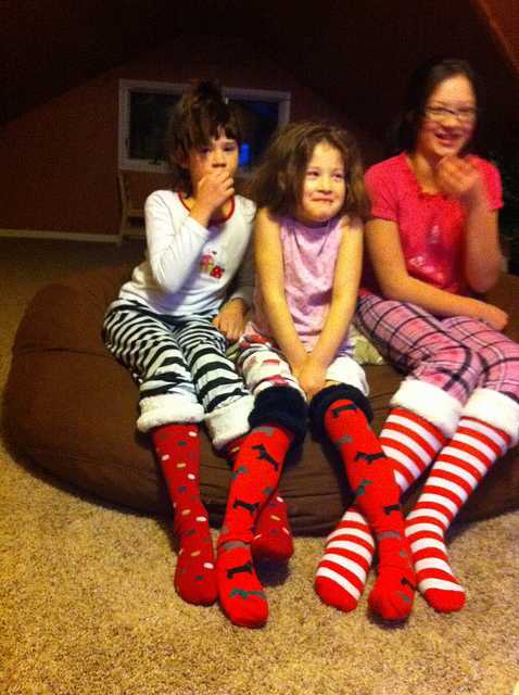 Family tradition: Wear silly Christmas socks on Christmas Adam and watch your favorite Christmas movie together. #overstuffedlife