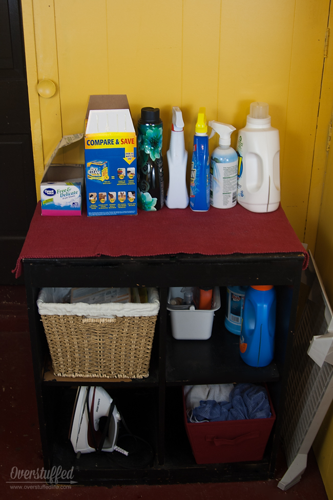 A functional laundry room always has a place to put supplies.