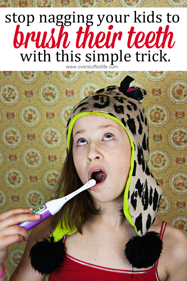 Do you tell your kids to brush their teeth 100 times a day? Stop the nagging and start doing this simple trick and watch those teeth get brushed happily! #overstuffedlife