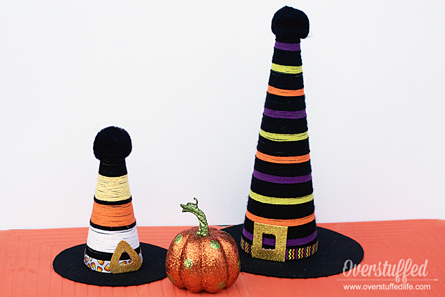 These cute DIY witch hats made out of yarn will be a fun addition to your Halloween decorations this October.