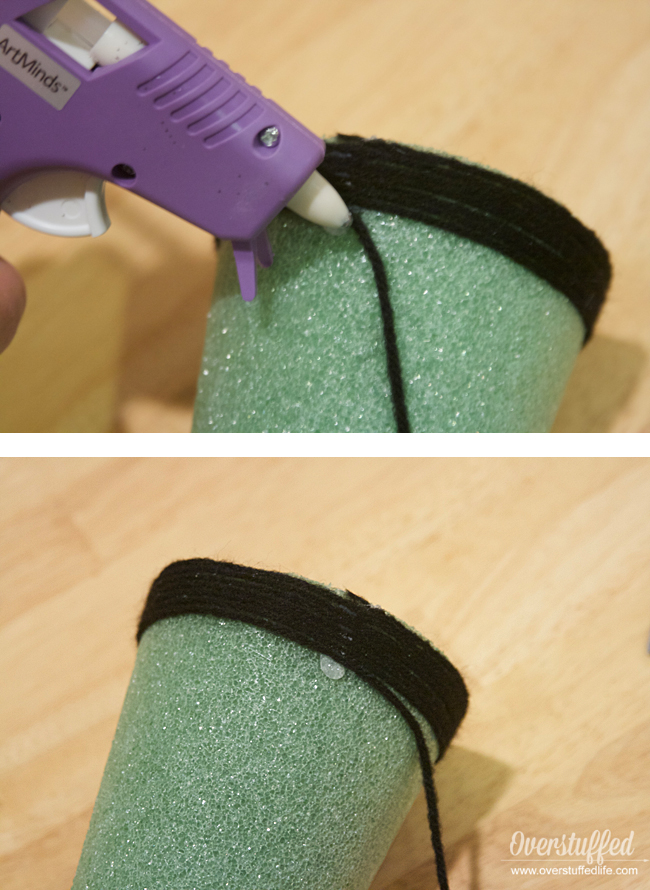 How to glue yarn onto foam cones to make Halloween witch hats.