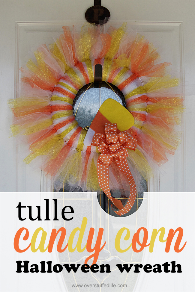 Make this delightful candy corn tulle Halloween wreath this year. It's simple to make and you'll have the most adorable decorations on the block!