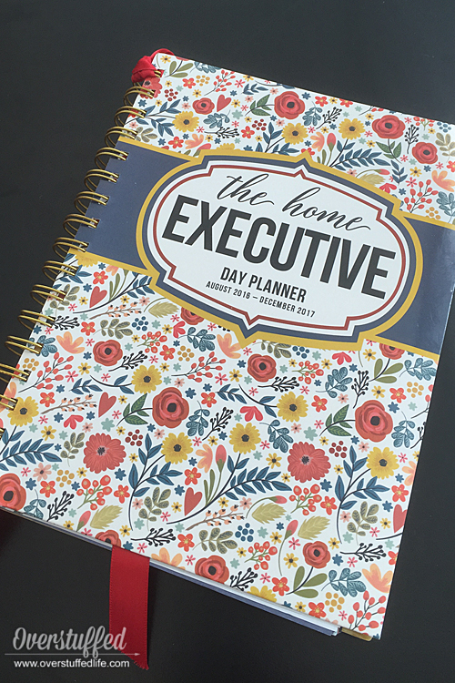 The Home Executive Day Planner features recipes, lots of planning space, a folder, and cute stickers to help you plan your day.