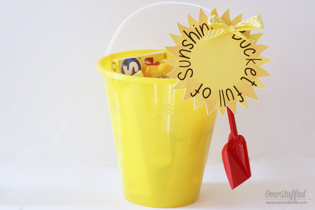 A Bucket Full of Sunshine—an adorable gift idea! Just fill up a yellow bucket with yellow goodies from Dollar Tree and use this free printable to make someone's day brighter!